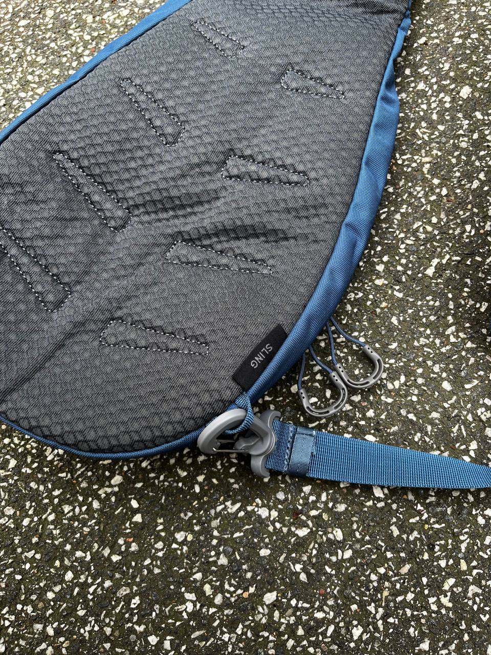 Sling bag osprey daylite i blå