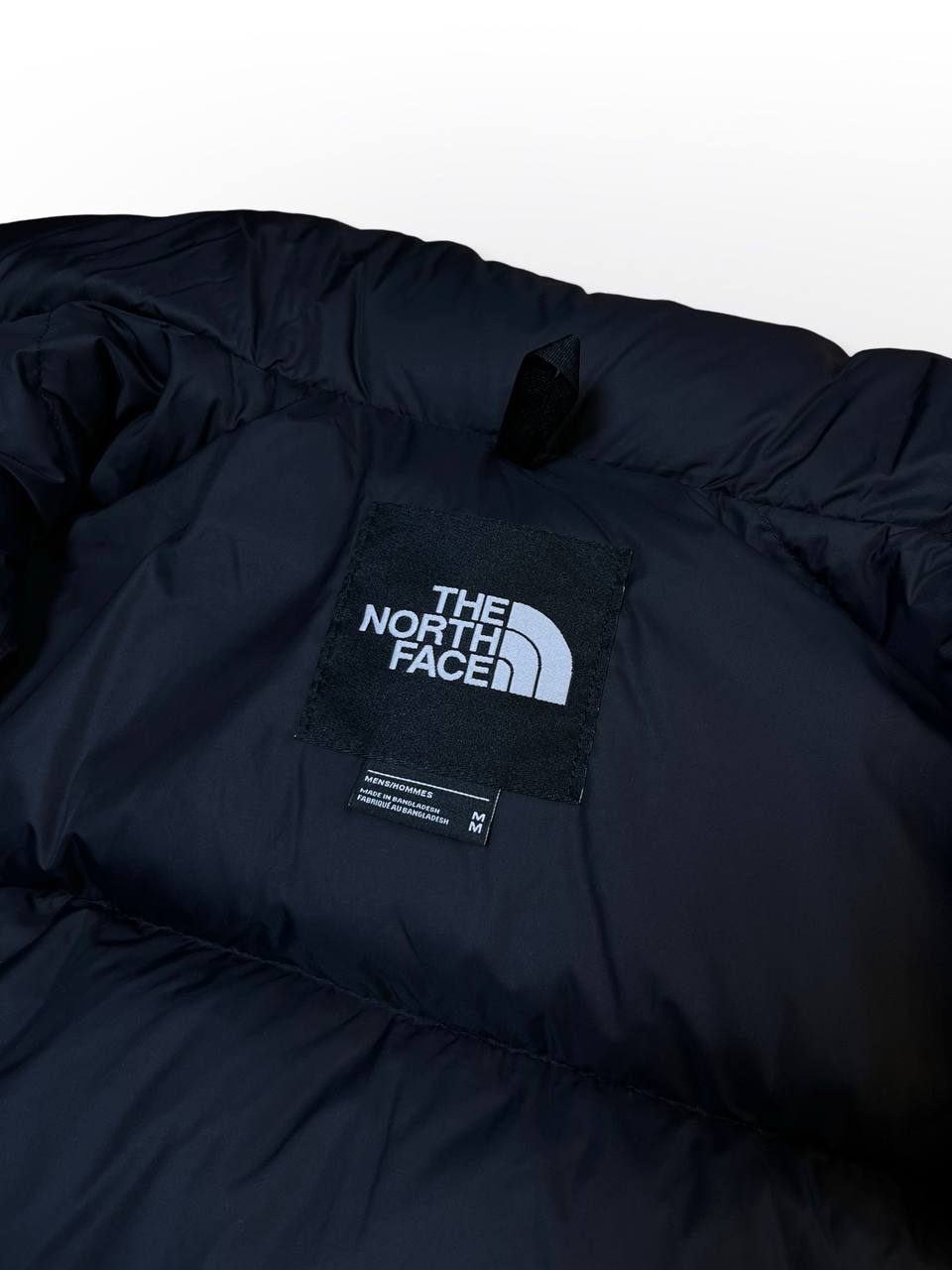 Puffer varm dynvest vintervest fra The North Face 700 med Goose Down insulation hætte og elastik i bunden i sort M medium herre mænd