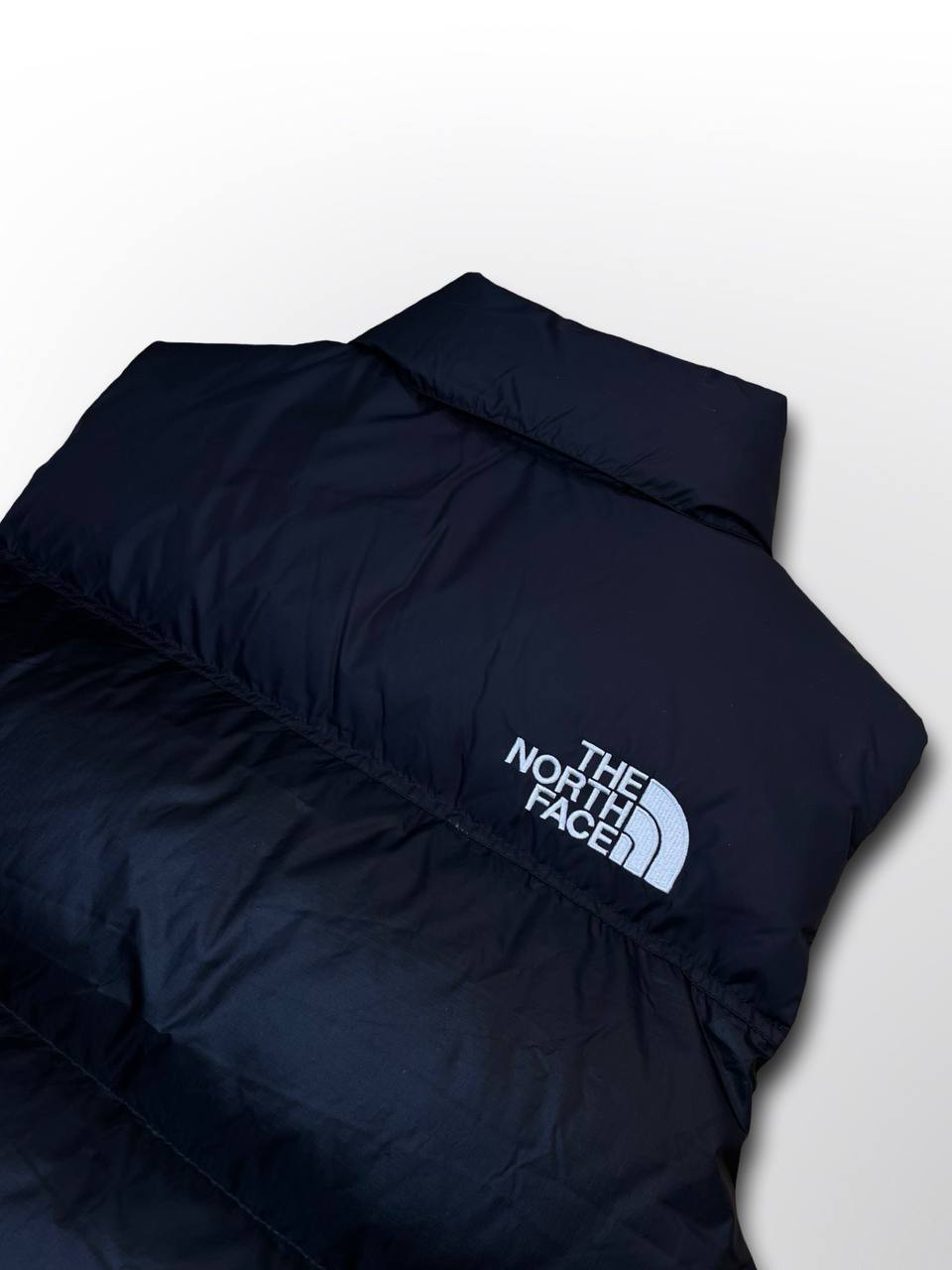 Puffer varm dynvest vintervest fra The North Face 700 med Goose Down insulation hætte og elastik i bunden i sort M medium herre mænd