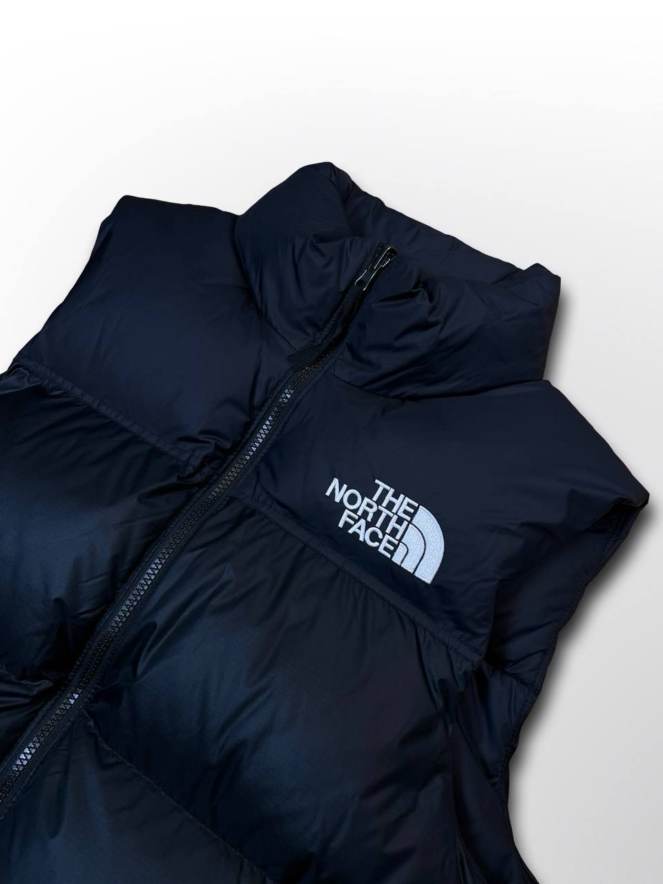 Puffer varm dynvest vintervest fra The North Face 700 med Goose Down insulation hætte og elastik i bunden i sort M medium herre mænd