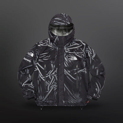 Supreme x The North Face Trompe L’Oeil Printed Taped Seam Shell Jacket
Size XL