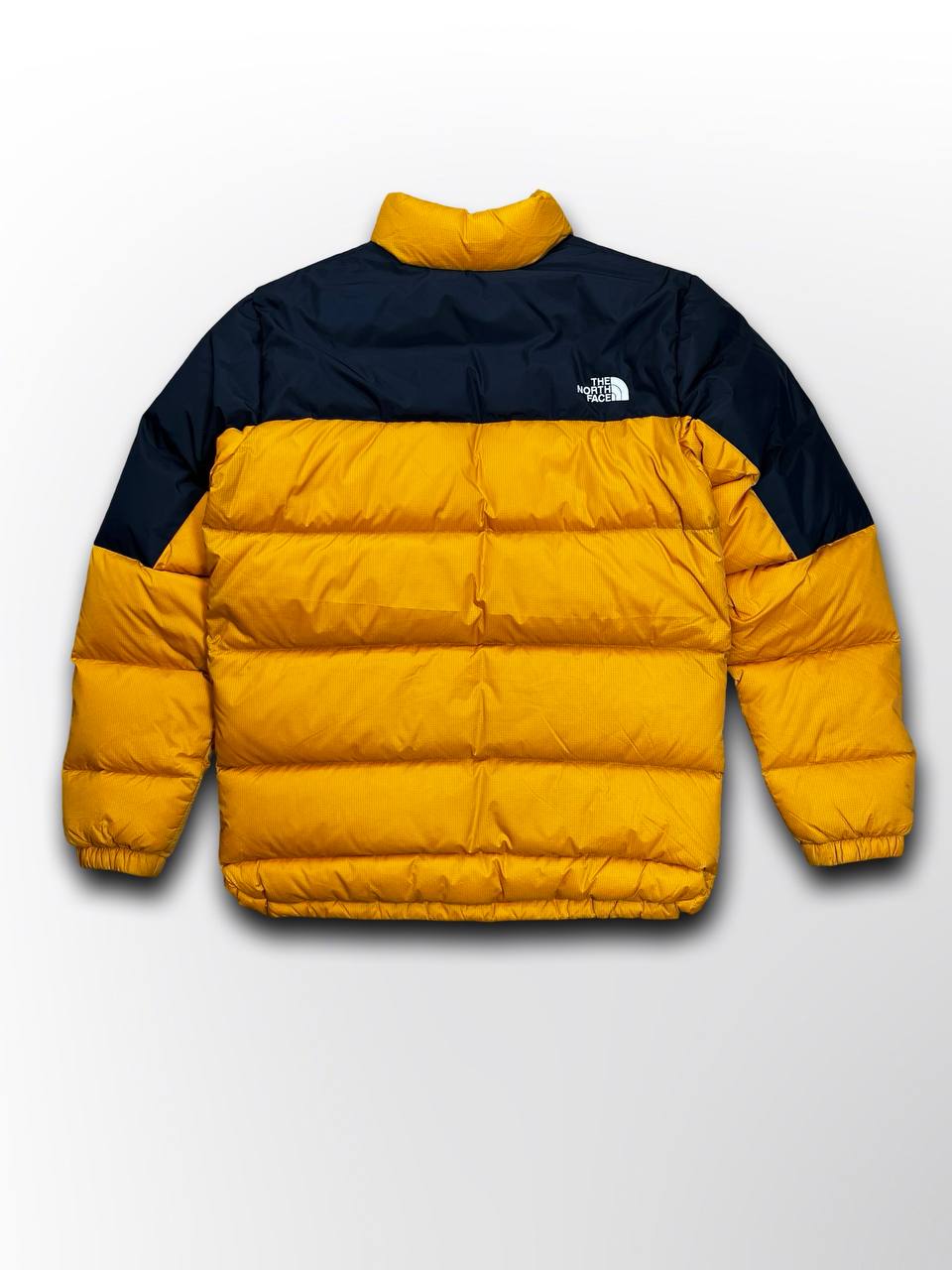 Brugt Dunjakke varm The North Face 700 Vinterjakke i god stand i gul orange og sort M medium mænd