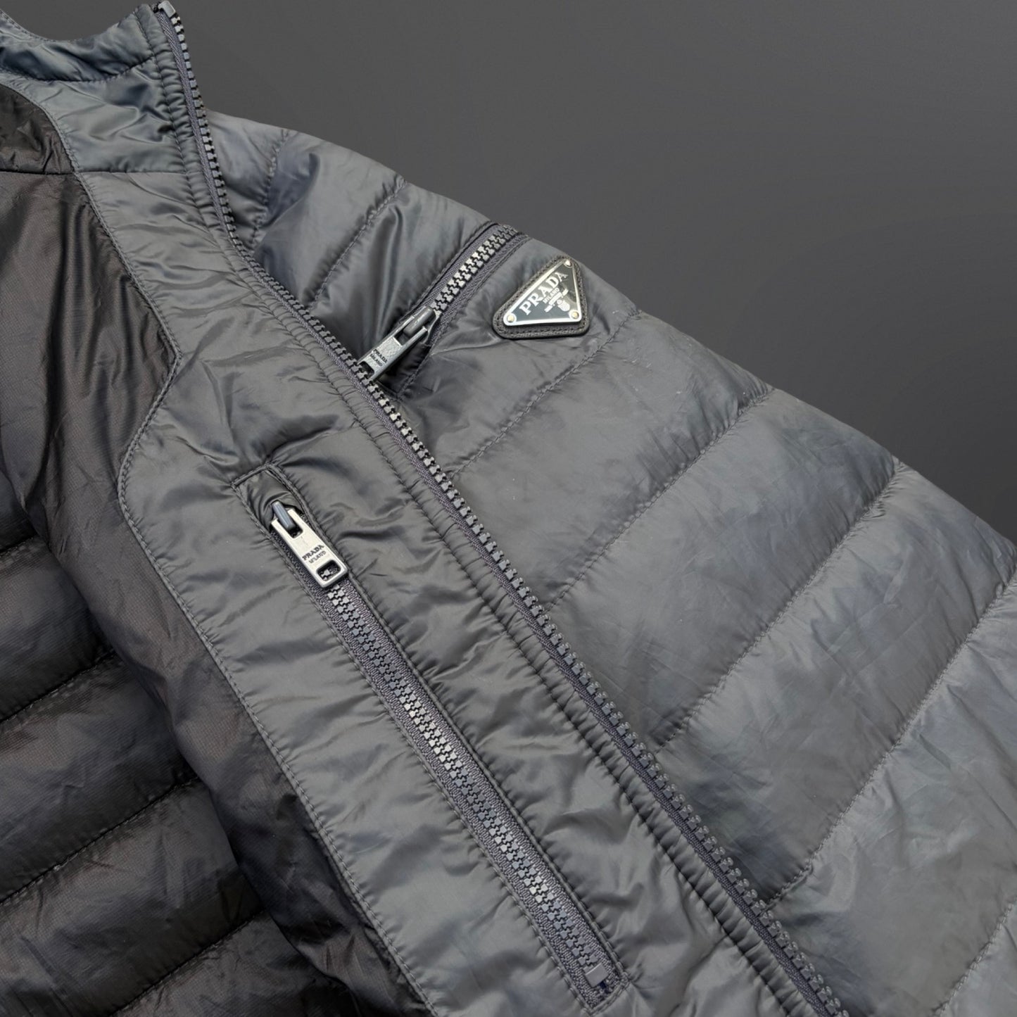 Prada Micro Puffer Jacket – Grey (Str. 52 / fits M)