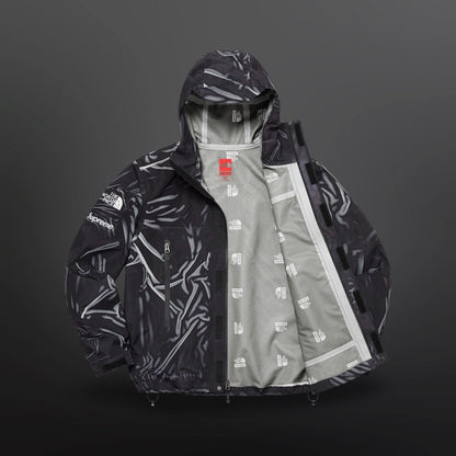 Supreme x The North Face Trompe L’Oeil Printed Taped Seam Shell Jacket
Size XL