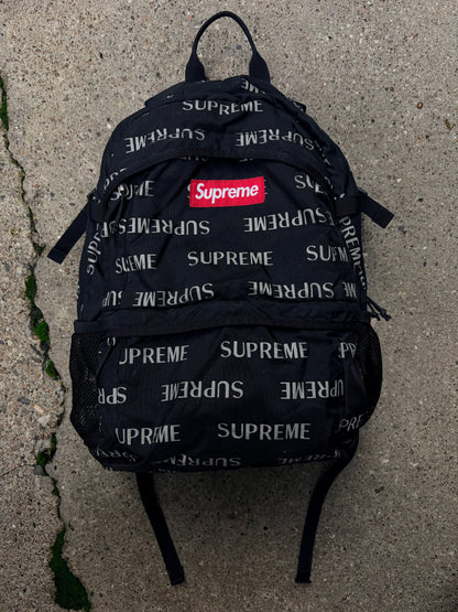 Supreme rygsæk – Sort med all-over logo og rødt Box Logo